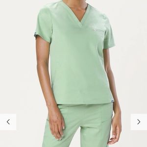 Brand new with tags sage green Mediclo green scrub shirt and pants